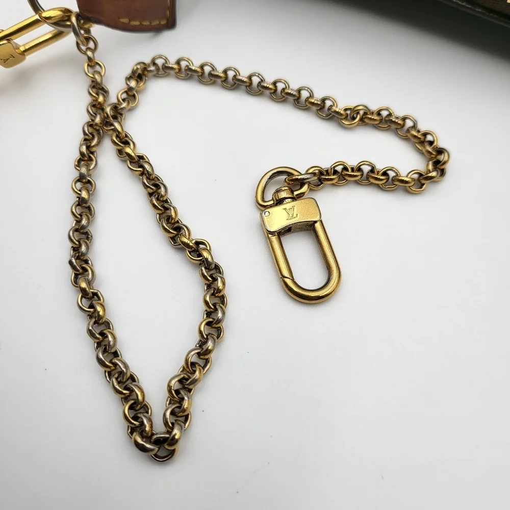 LOUIS VUITTON Eva Monogram Leather Pochette Bag..Authentic..